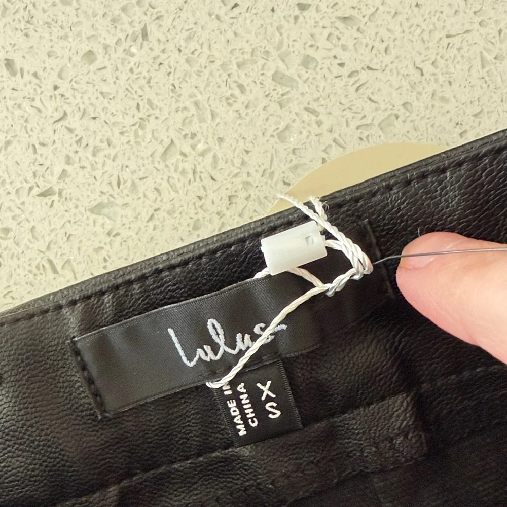 Lulu's Black Faux Leather Mini Skirt with Notch Detail - Picture 2 of 3